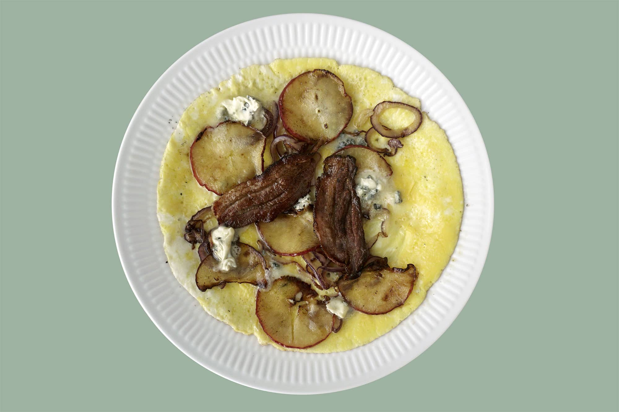 Apple Bottom Blue: Omelet w. Blue Cheese, Apple, Red Onion & Bacon
